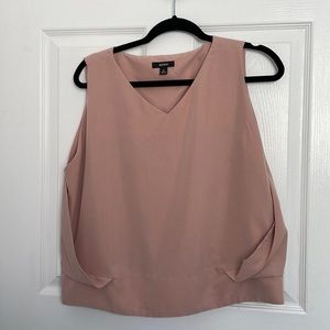 Sleeveless v-neck dust rose top. Worn once